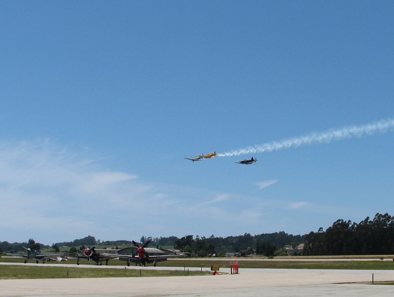 Texans in the sky, Mustang and friends on the ground