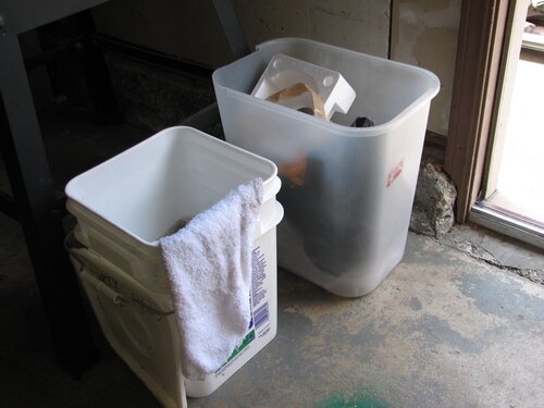 trash can and rag bucket