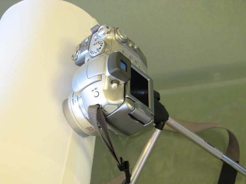 Camera looking into horizontal light tent