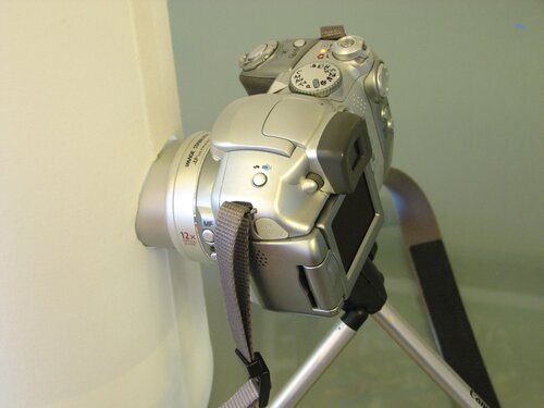 Camera looking into vertical light tent