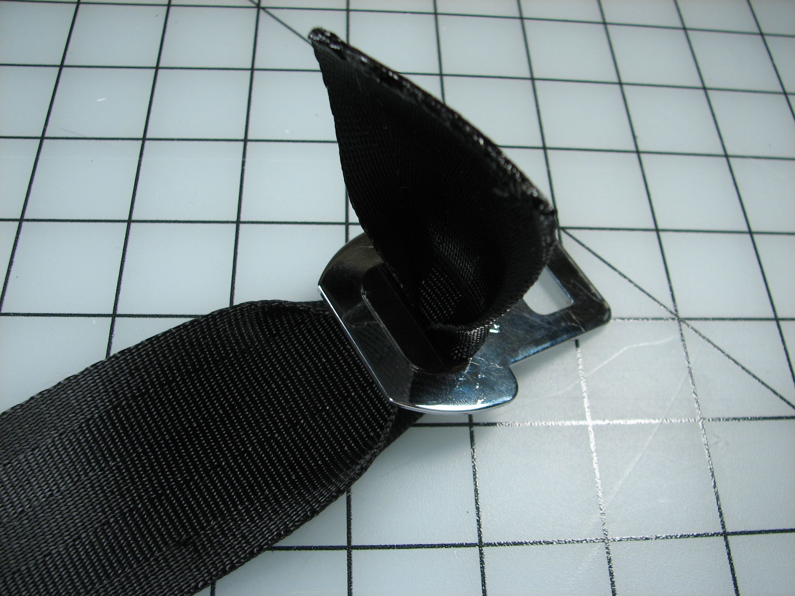 Unthreading the old belt