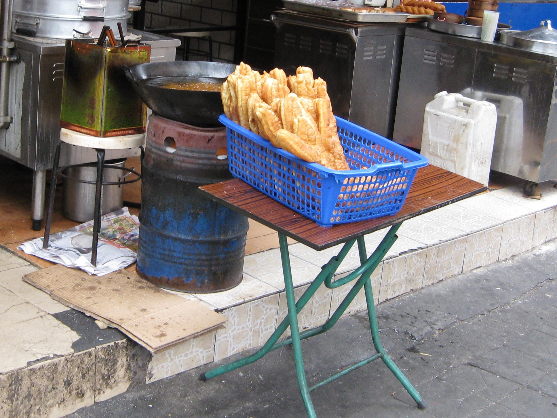 Wok on burning barrel