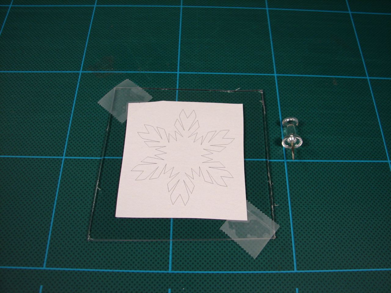 snowflake taped on