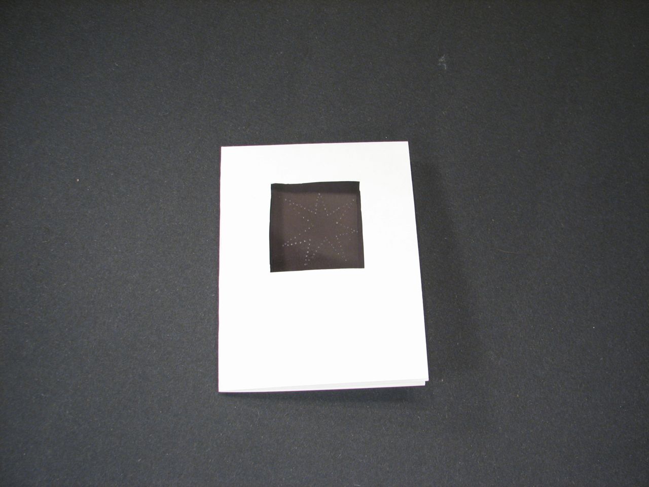 card (off) on black background