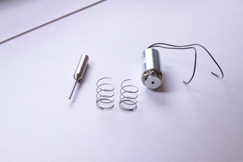 Solenoid with spring