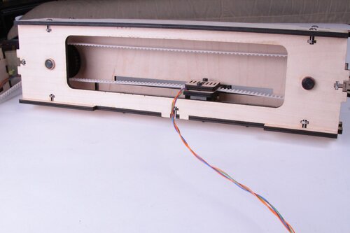 Paddle assembly on timing belt