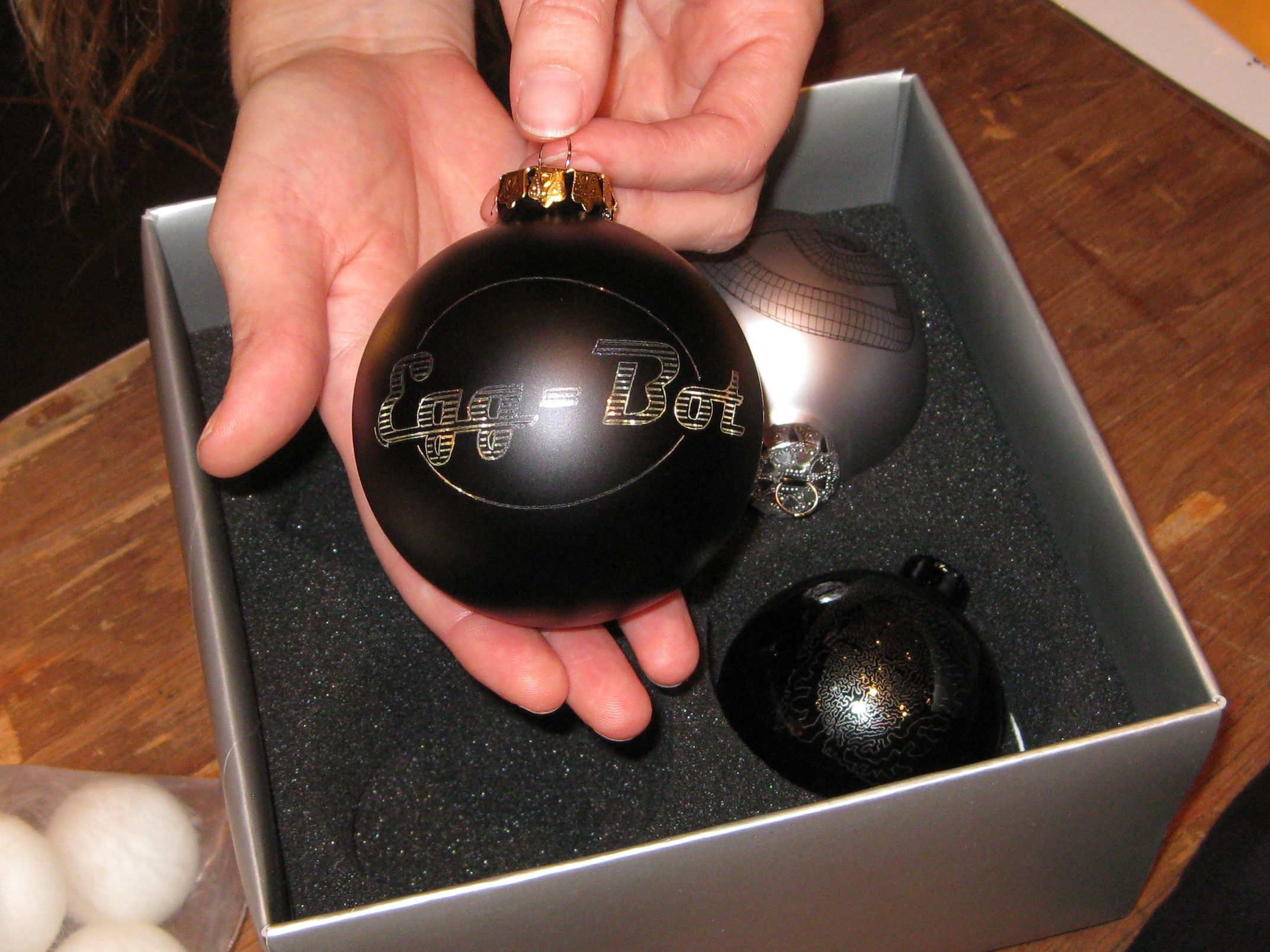 Engraved, painted ornament