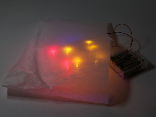 under a diffuser with blue covered