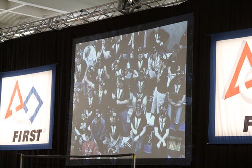 us in the stands on the screen