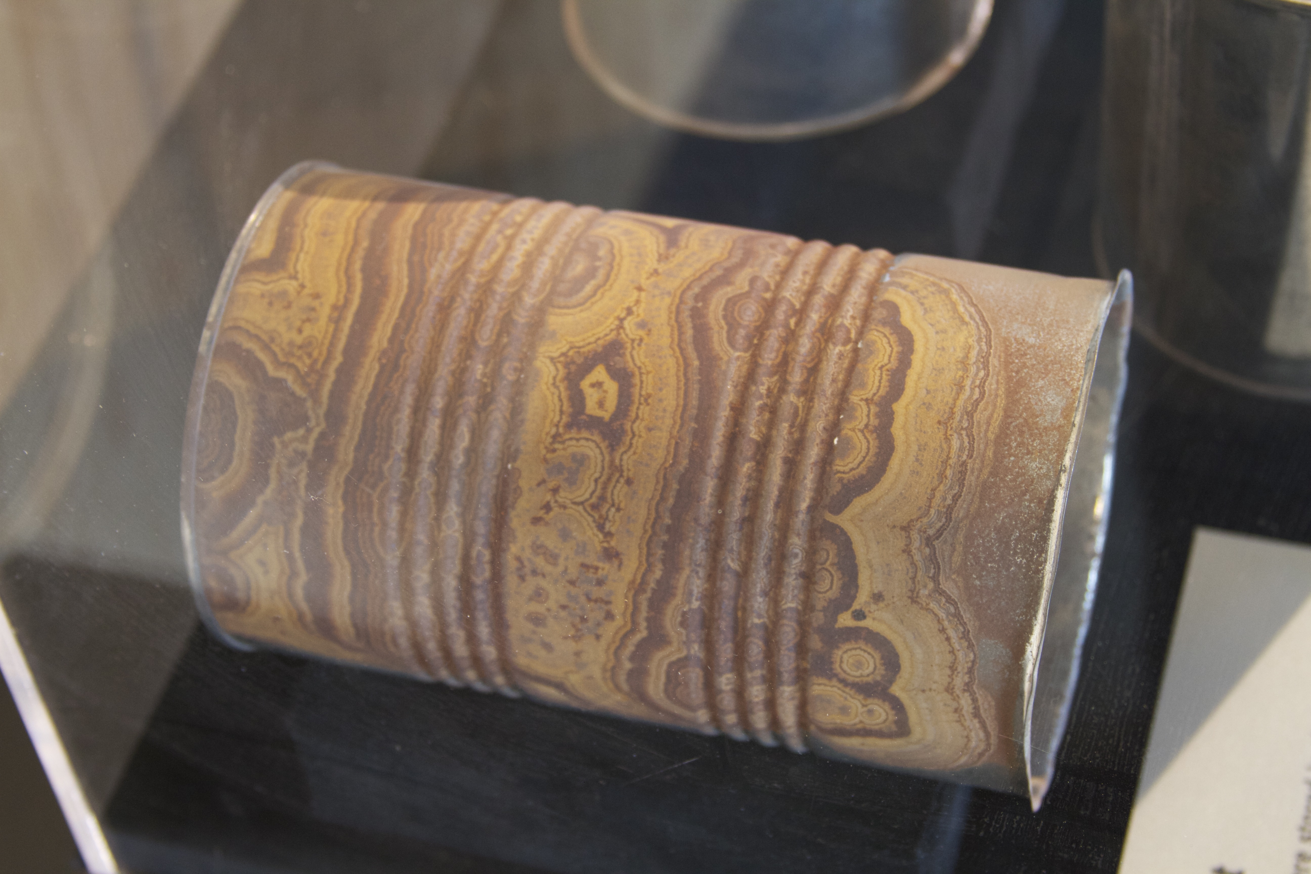 Rust patterns on cans from CalAcademy