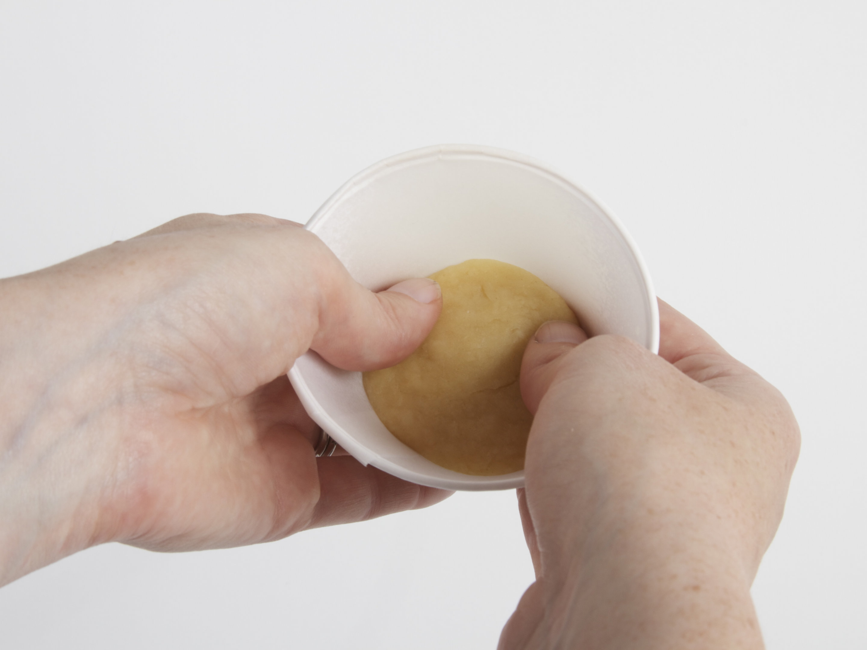 Sconic Sections: pressing dough into wrapper