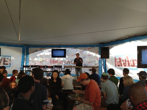 Bunnie on stage talking about the dangers of being vegetarian in China