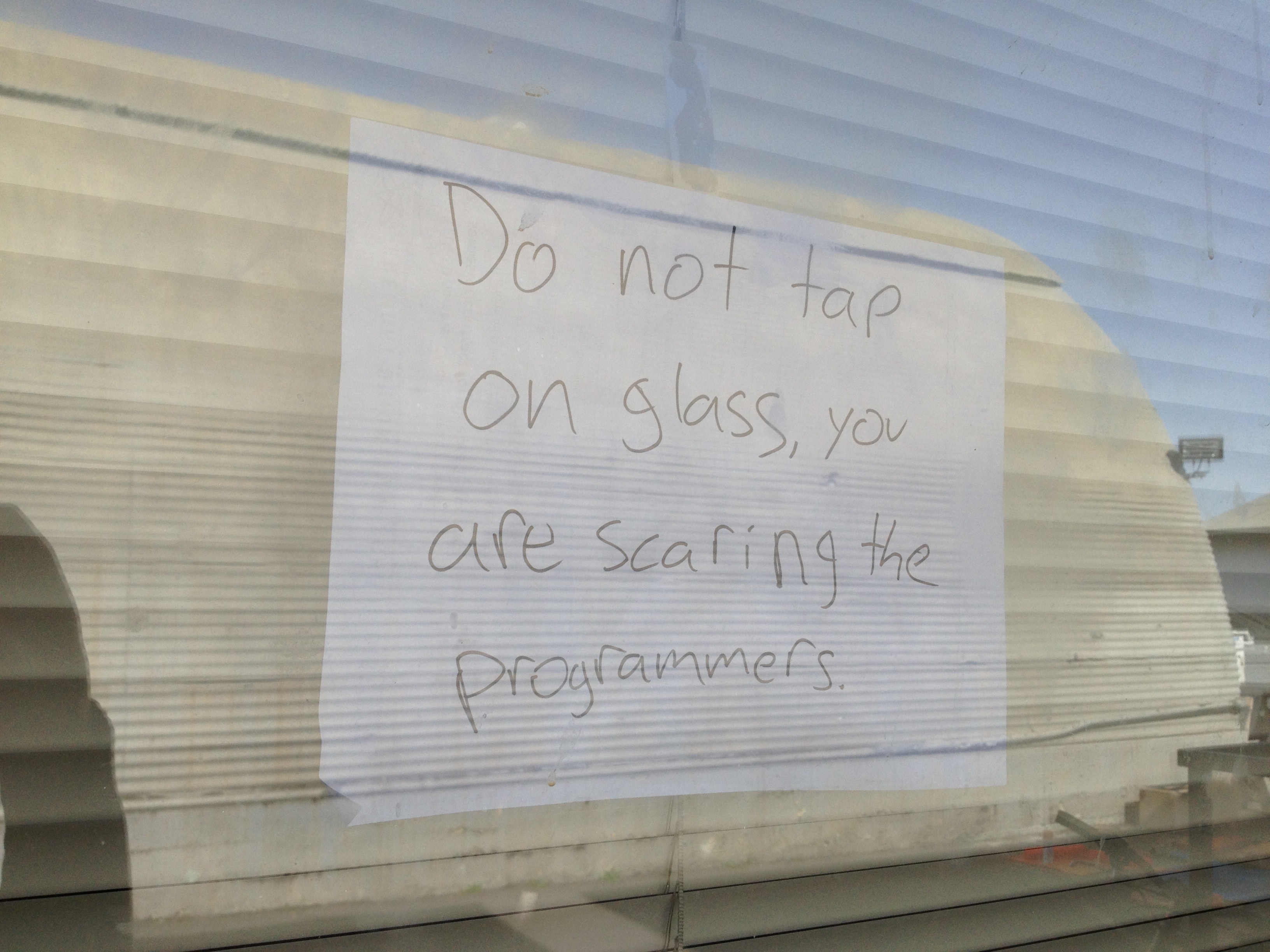 Do not tap on glass, you are scaring the programmers