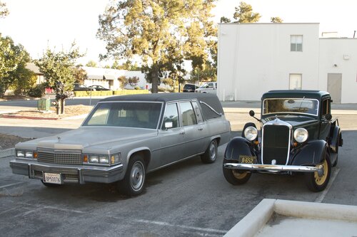 Sarah the truck next to Victoria the hearse