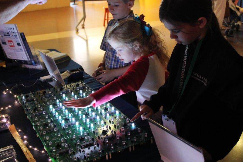 Kids interacting with LEDs