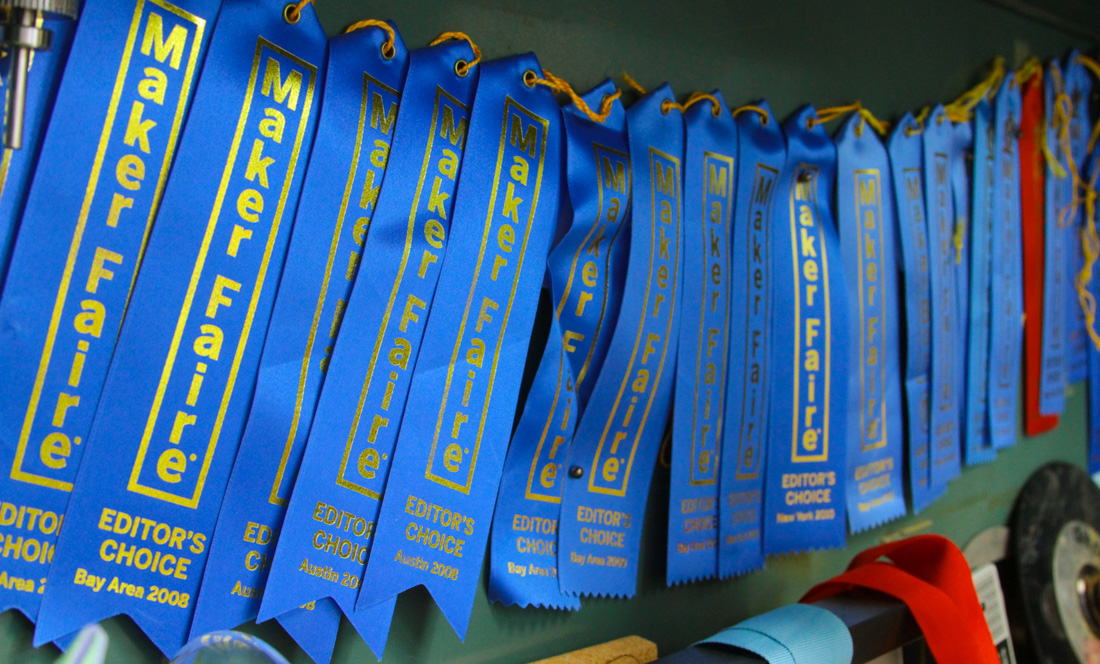 maker faire ribbons being displayed in a cabinet